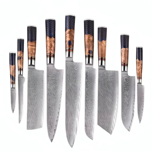 Set of Damascus steel kitchen knives with wooden handles on a white background