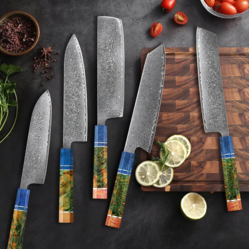 Five Takashi Damascus kitchen knife profiles arranged on a dark board
