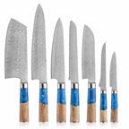 Aokaze seven-piece Damascus chef knife set with blue resin and wood handles on white