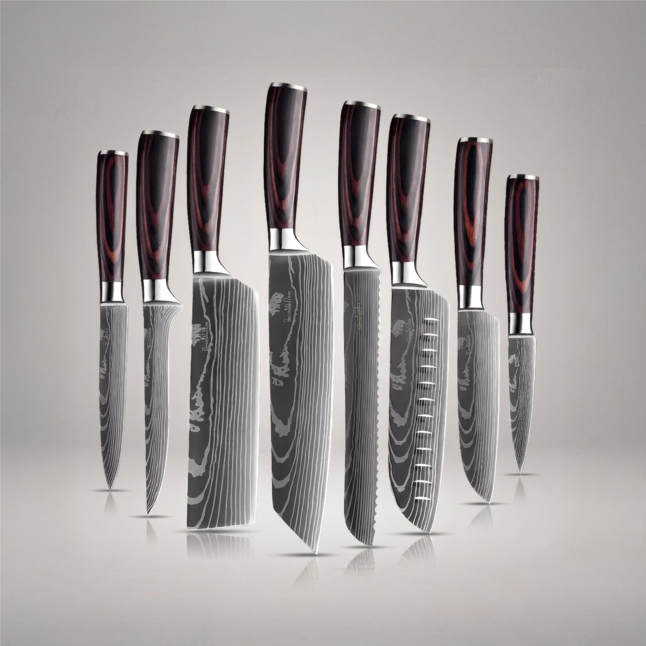 Set of eight japanese damascus apttern knives with wooden handles on a reflective surface